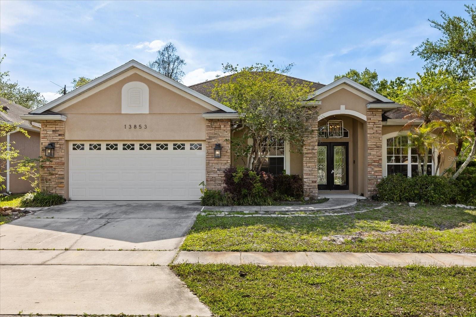 13853 SUNSHOWERS CIRCLE