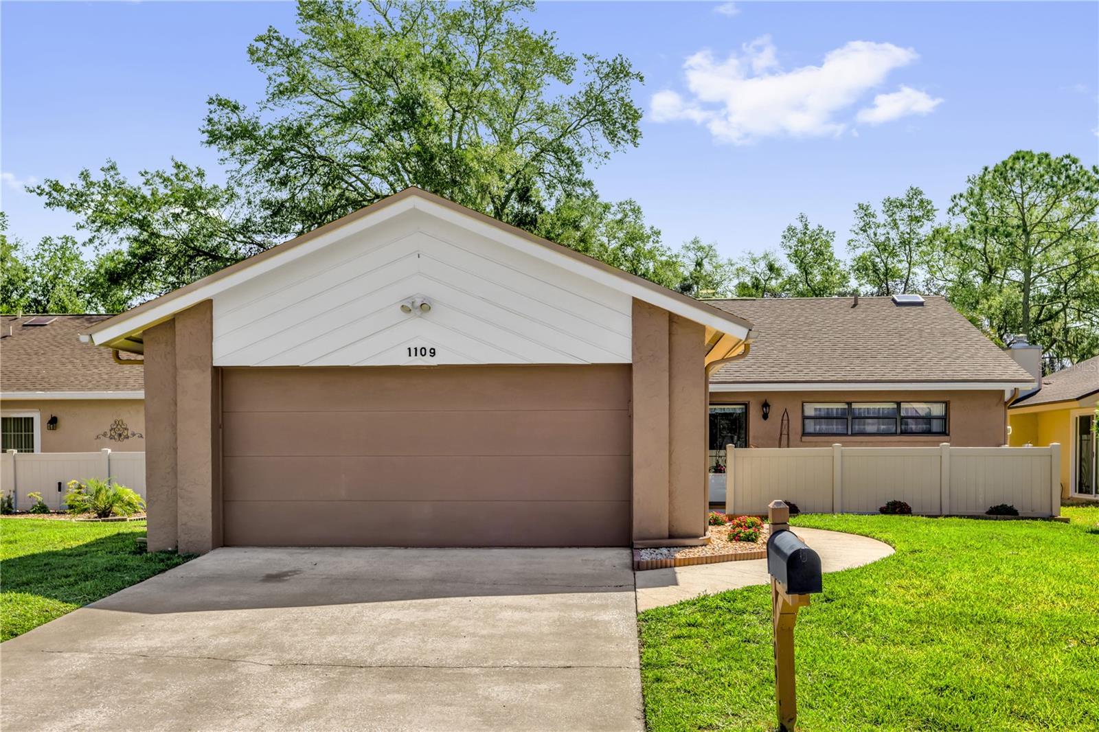 1109 DAPPLED ELM LANE